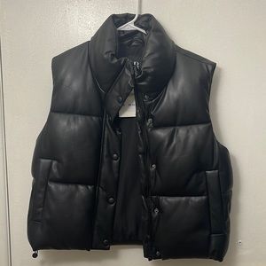 Brand new Black faux leather puffer vest from Zara.